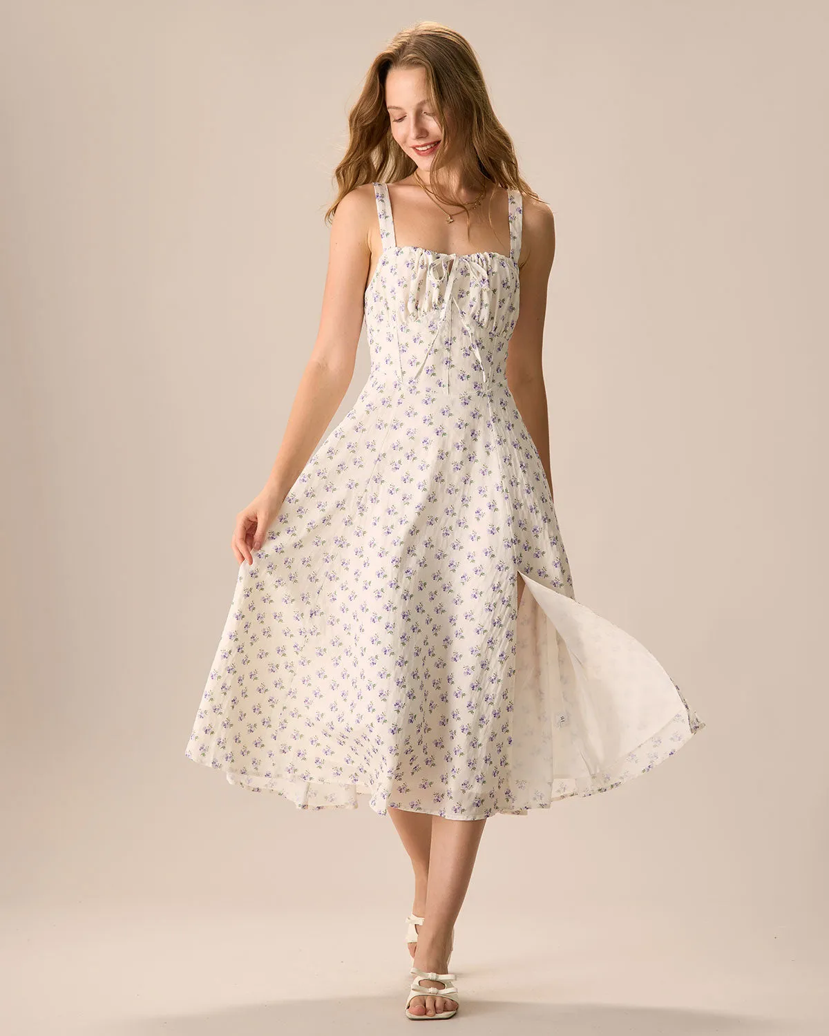The Beige Ruched Split Hem Floral Midi Dress sold by rihoas