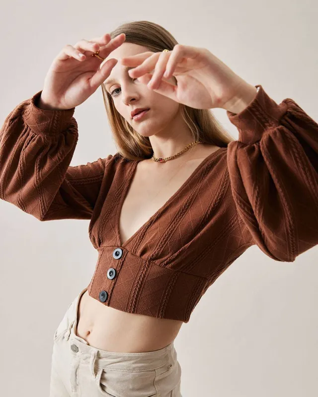 The Deep V-neck Knitted Crop Top sold by rihoas