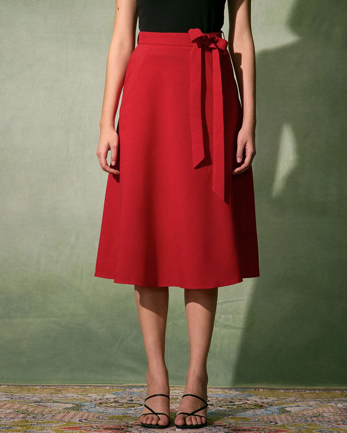 The Red High-Waisted Tie Strap Midi Skirt sold by rihoas