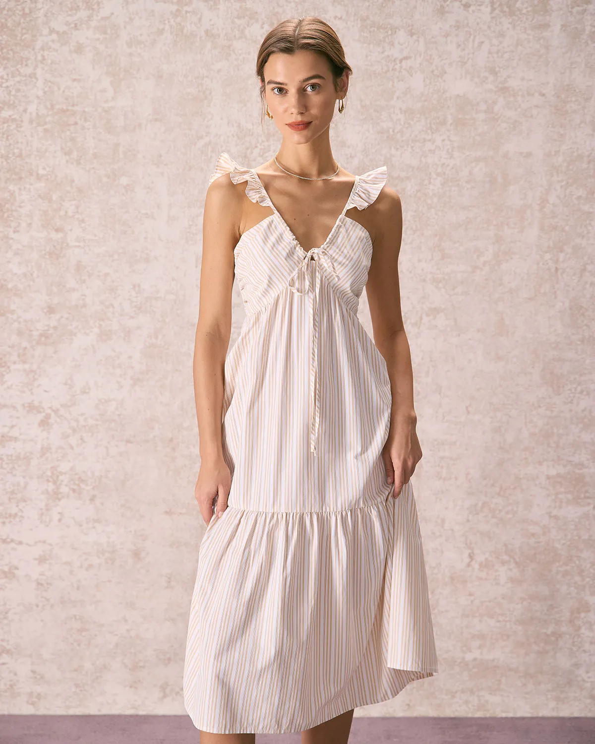 The Yellow V Neck Striped Ruffle Midi Dress sold by rihoas