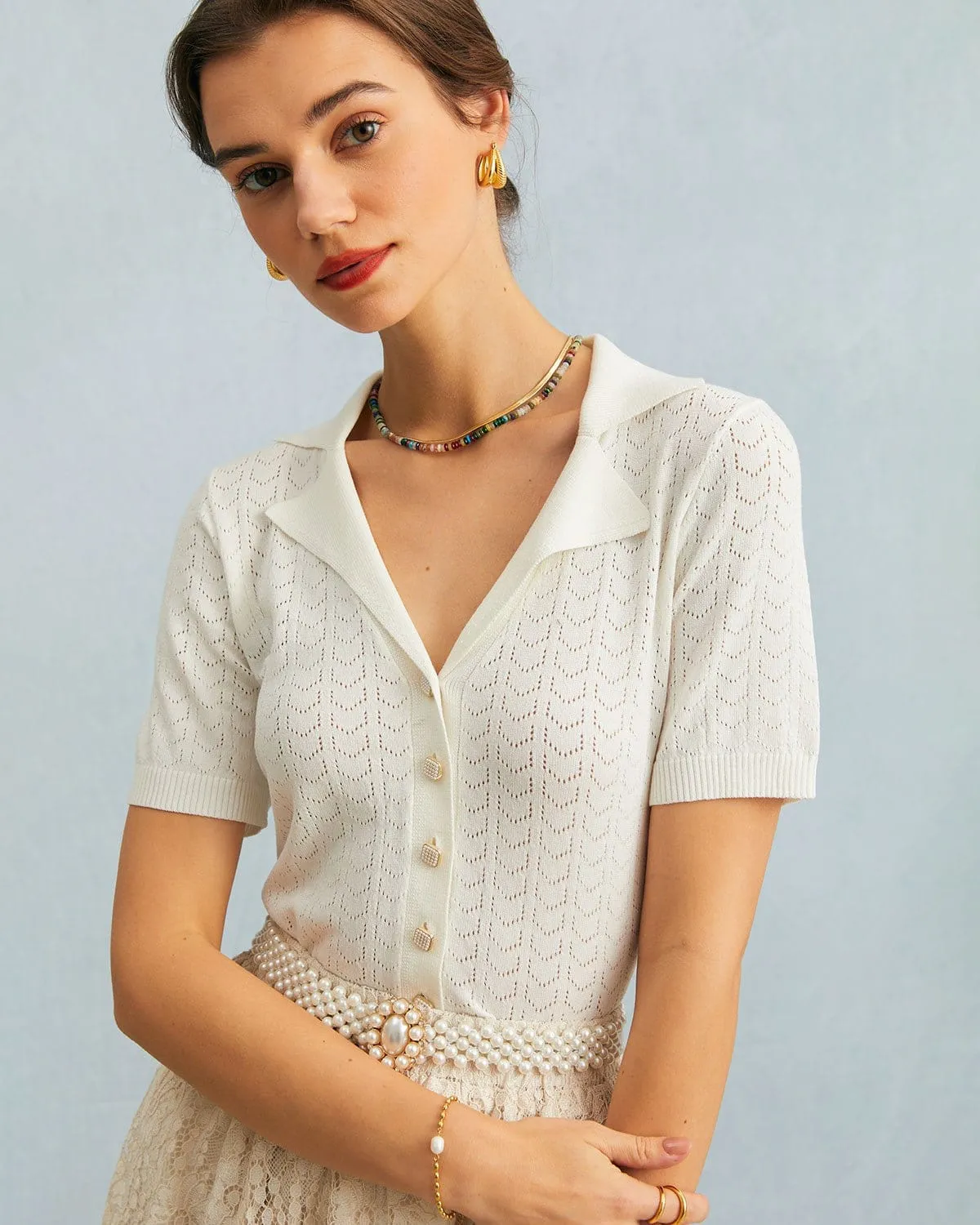 The White Collared Pointelle Knit Top sold by rihoas