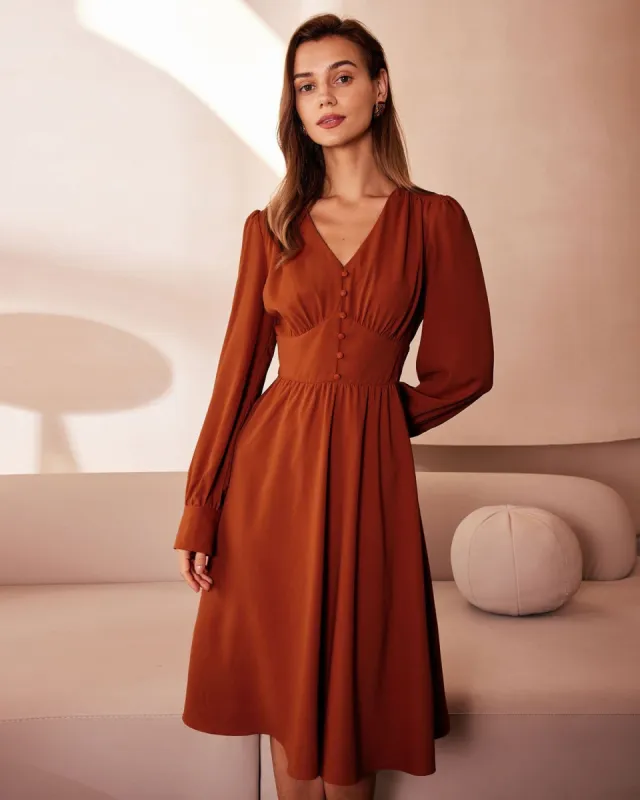 The Orange V Neck Pleated Button Midi Dress sold by rihoas
