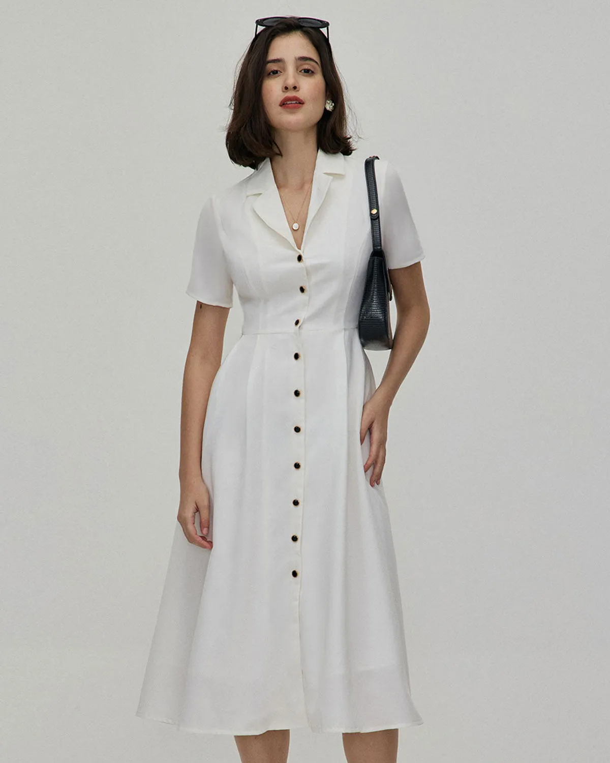 The White Lapel Short Sleeve Button-up Midi Dress sold by rihoas