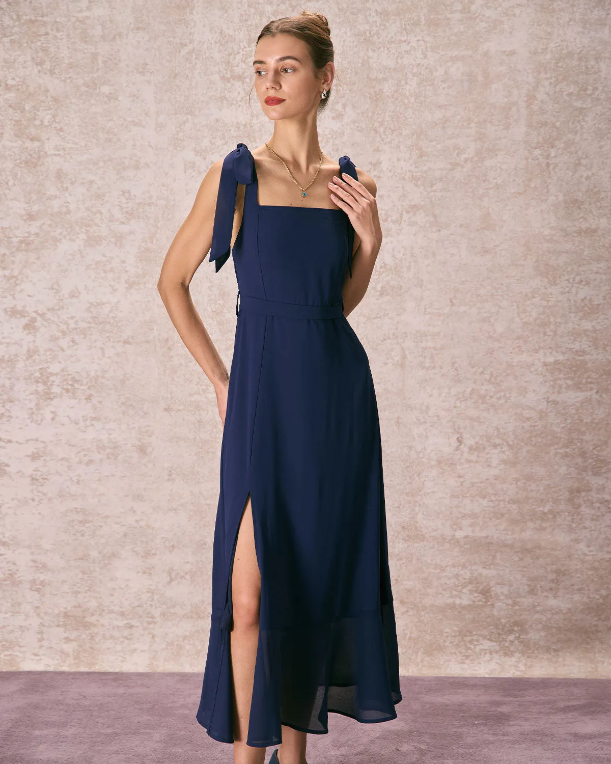 The Navy Square Neck Ruffle Hem Midi Dress sold by rihoas