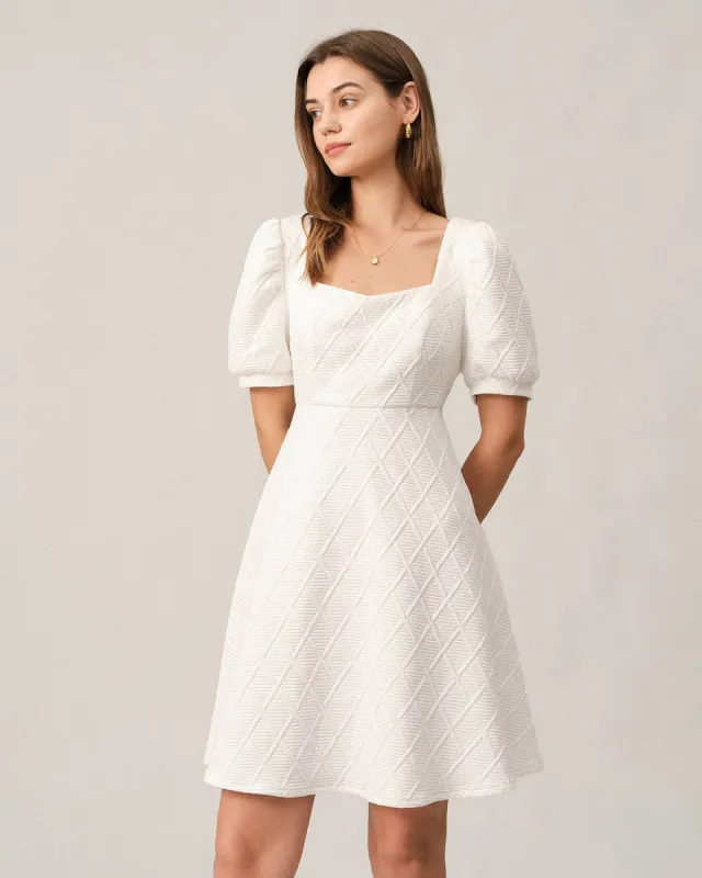 The Solid Textured Puff Sleeve Mini Dress sold by rihoas