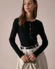The Black Boat Neck Bowknot Front Knit Top sold by rihoas