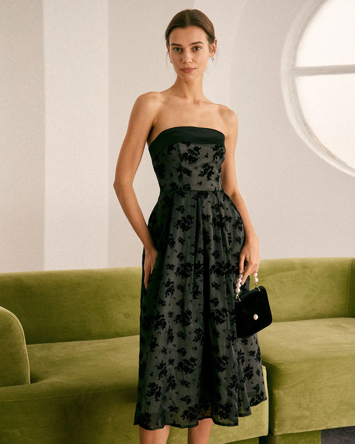 The Black Floral Strapless Midi Dress sold by rihoas