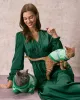 The Green V Neck Ruched Satin Midi Dress sold by rihoas
