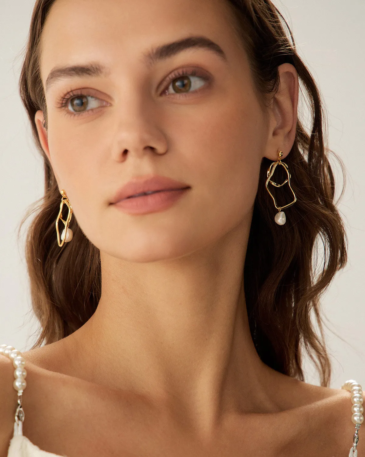 Metal Pearl Earrings sold by rihoas