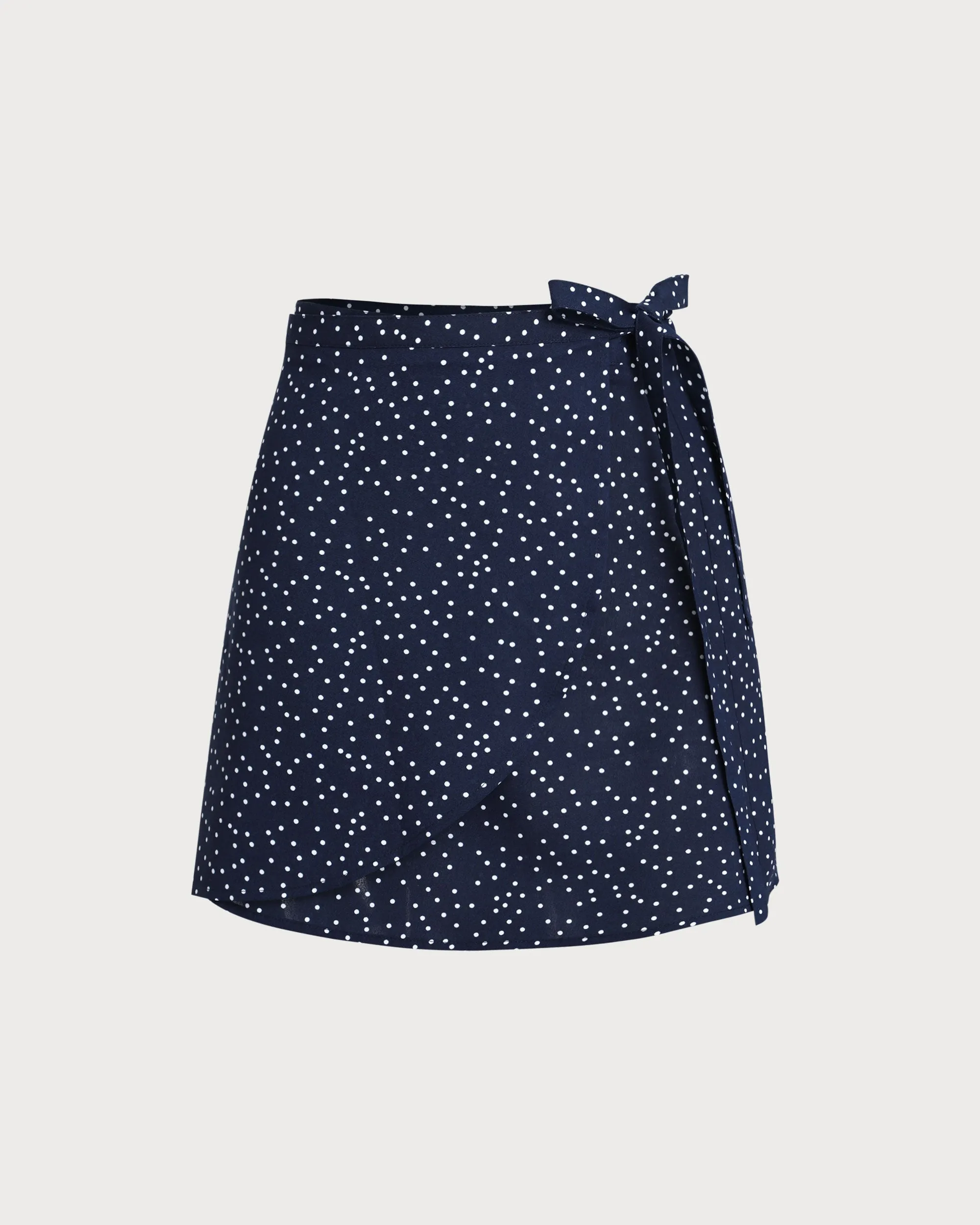 Navy Polka Dot Wrap Mini Skirt sold by rihoas