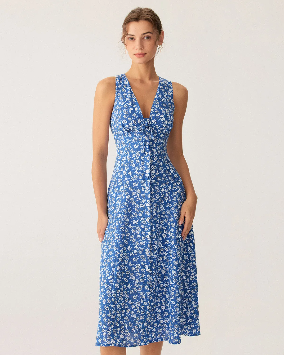 Blue Floral V Neck Sleeveless Midi Dress sold by rihoas