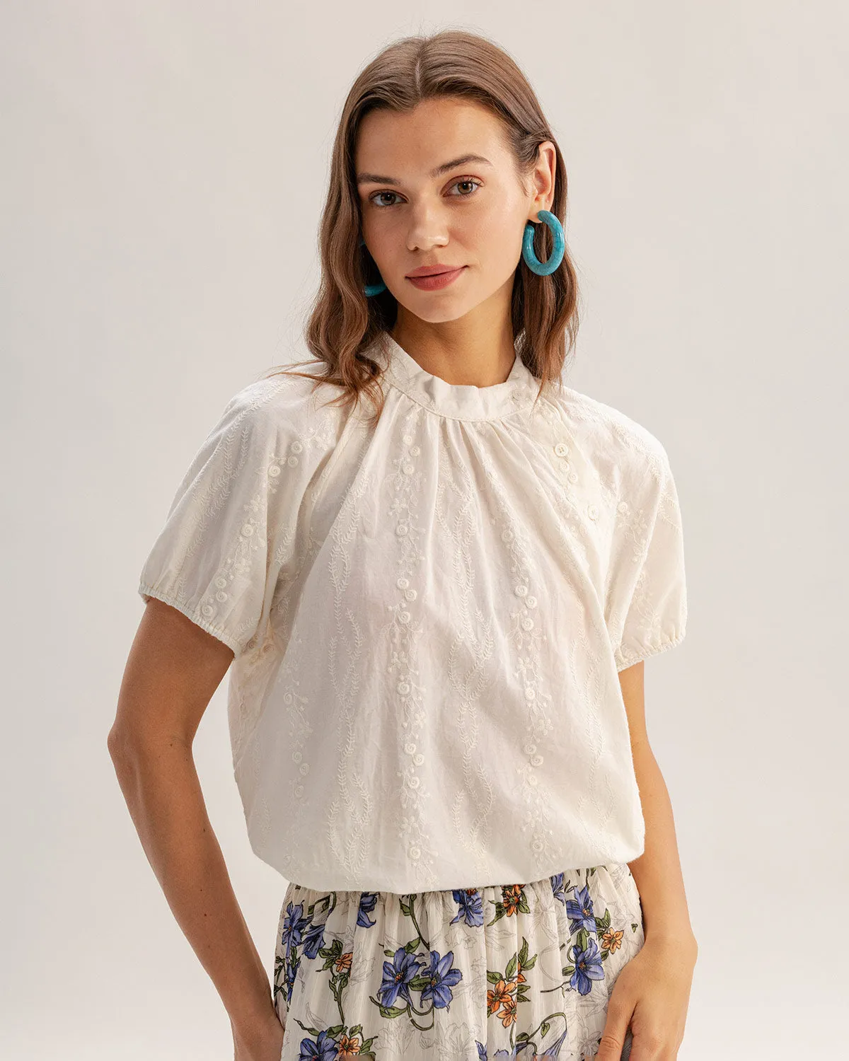 Beige Mock Neck Textured Tee sold by rihoas