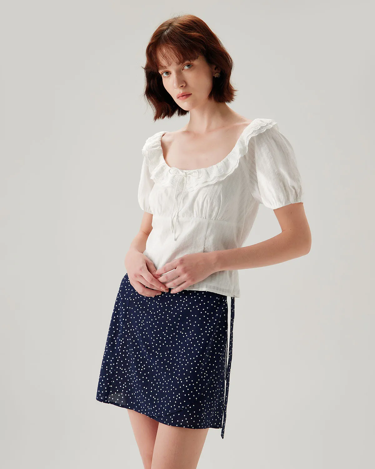 White Textured Scoop Neck Ruffle Blouse sold by rihoas