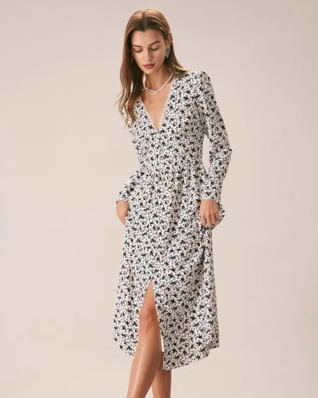 The Black Deep V Neck Floral Lace Midi Dress sold by rihoas