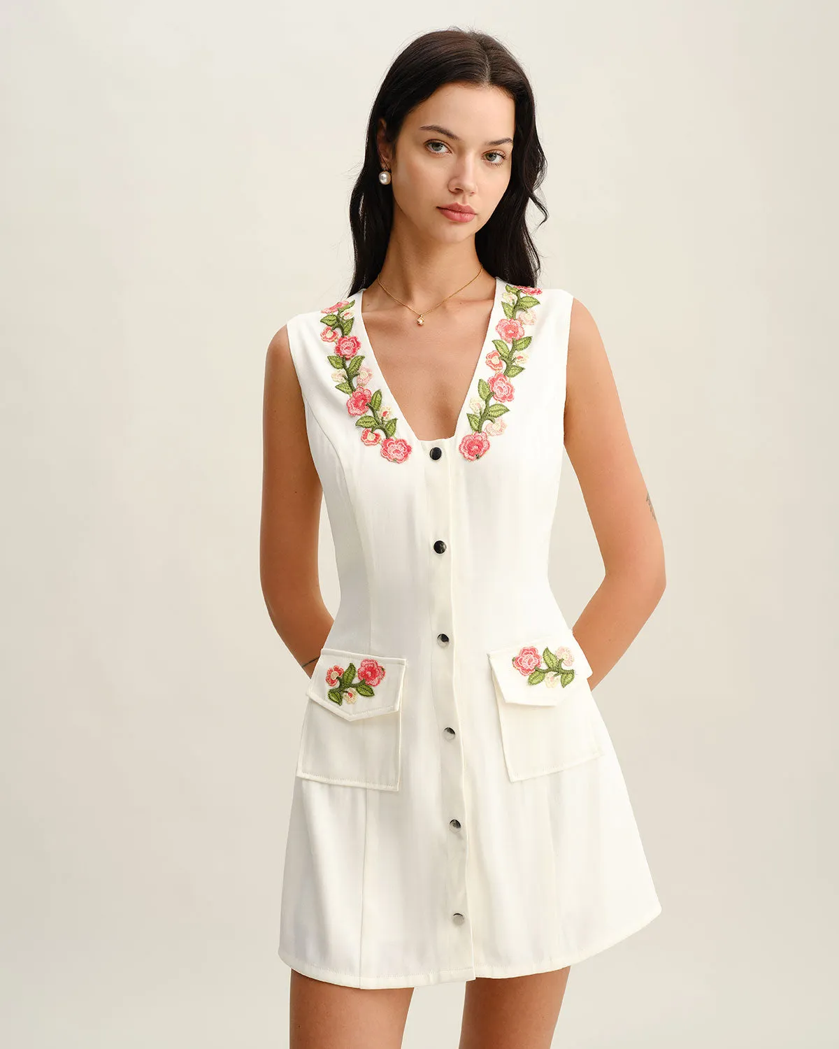 White Floral V Neck Sleeveless Mini Dress sold by rihoas