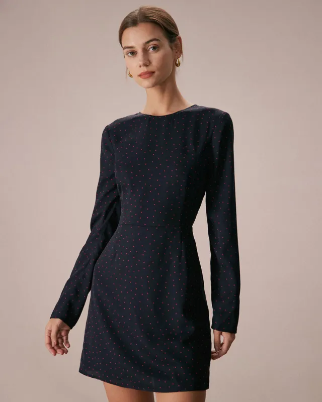 The Navy Crew Neck Polka Dot Mini Dress sold by rihoas