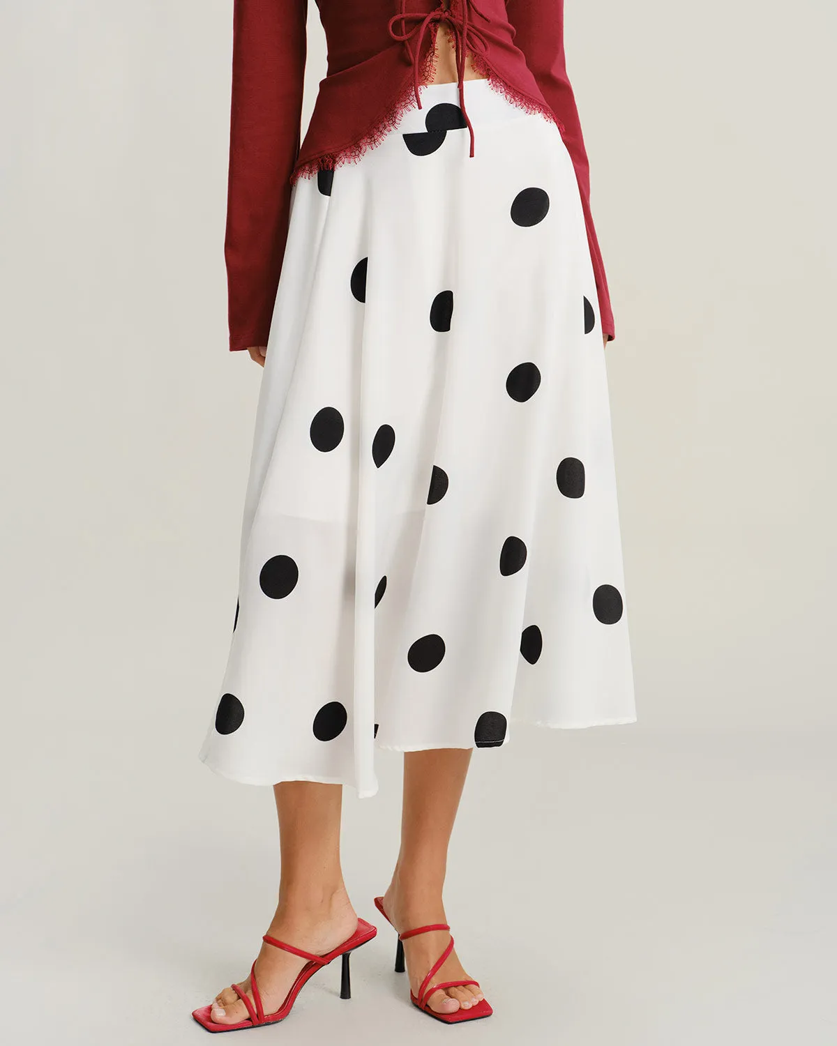 White Polka Dot Elastic Waist Midi Skirt sold by rihoas