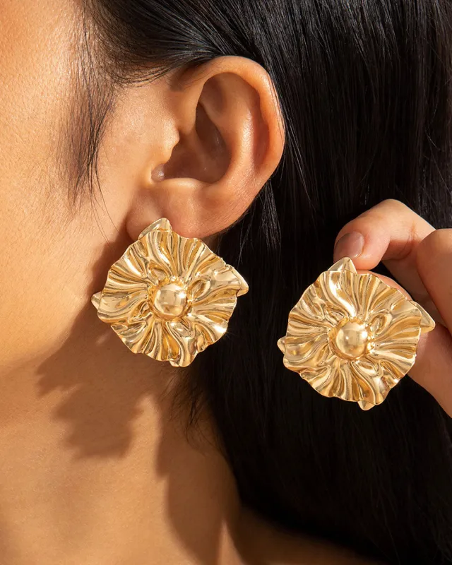 Gold Earrings sold by rihoas
