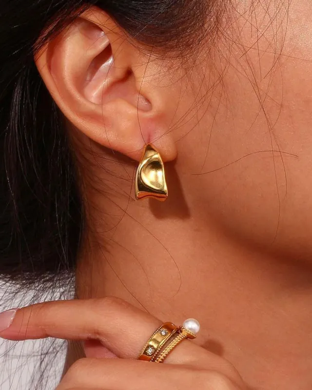 Gold Earrings sold by rihoas