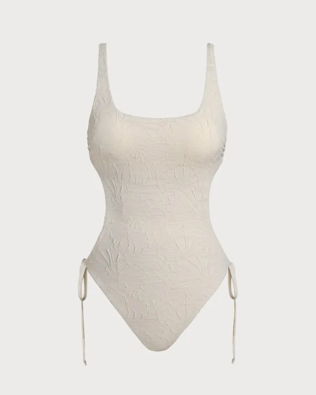 Off White Textured Bralette One Piece Swimwear sold by rihoas