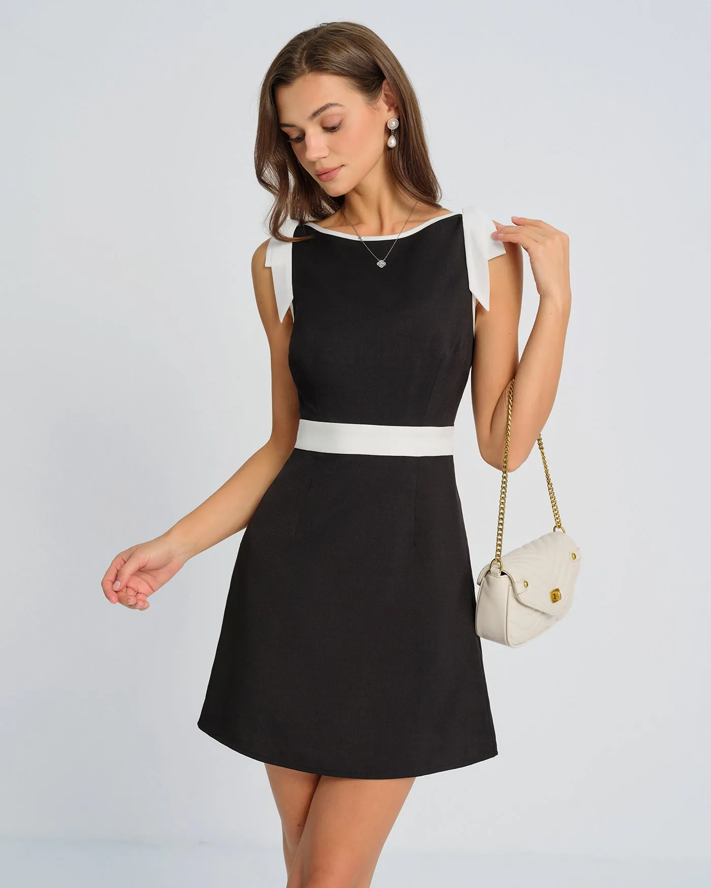 Black Contrasting Bowknot Mini Dress sold by rihoas