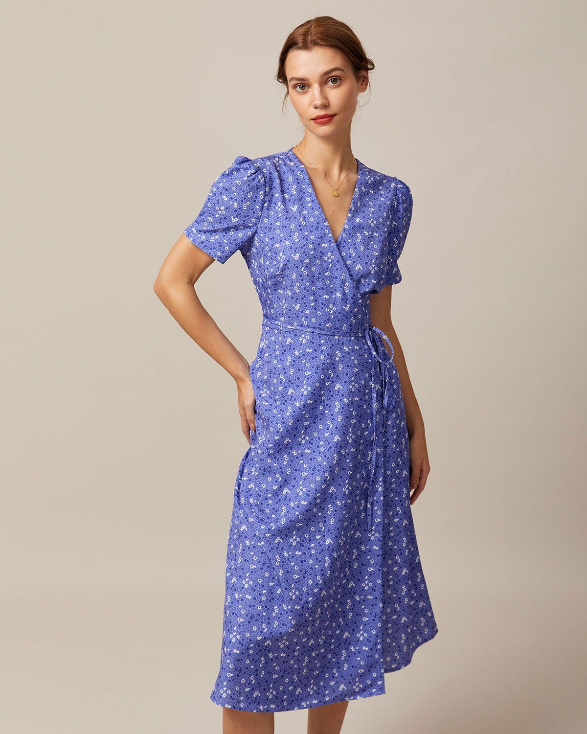 The Purple V Neck Floral Wrap Midi Dress sold by rihoas