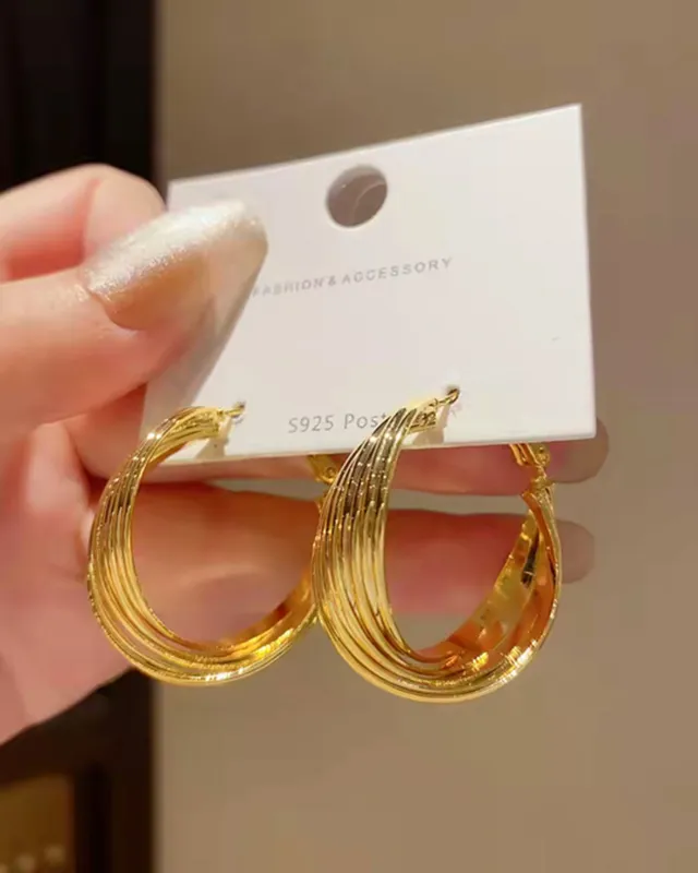 Gold Earrings sold by rihoas