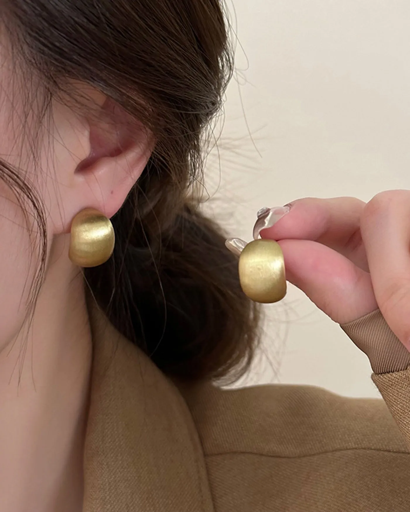 Gold Earrings sold by rihoas