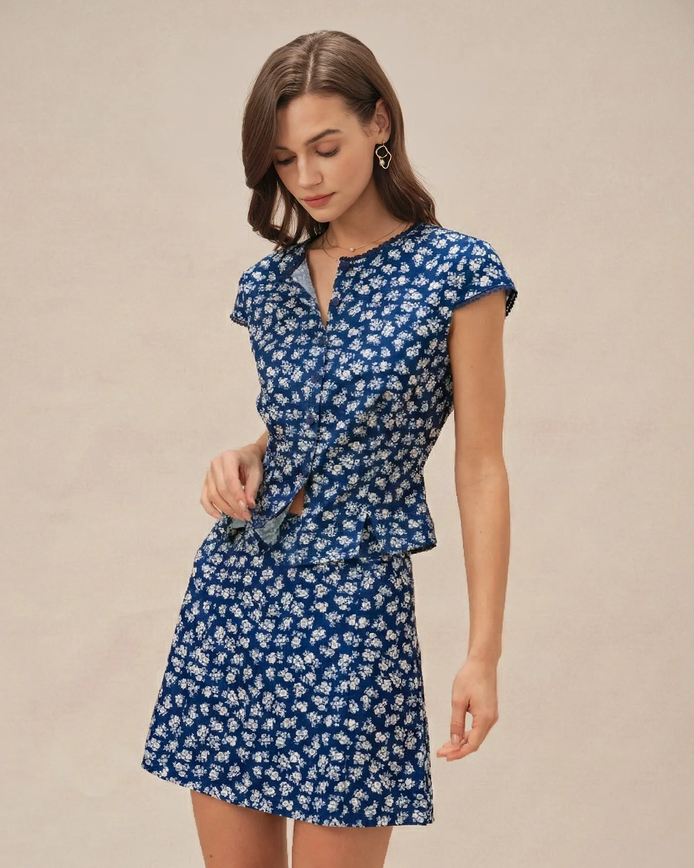 Blue Floral Cap Sleeve Button Blouse sold by rihoas