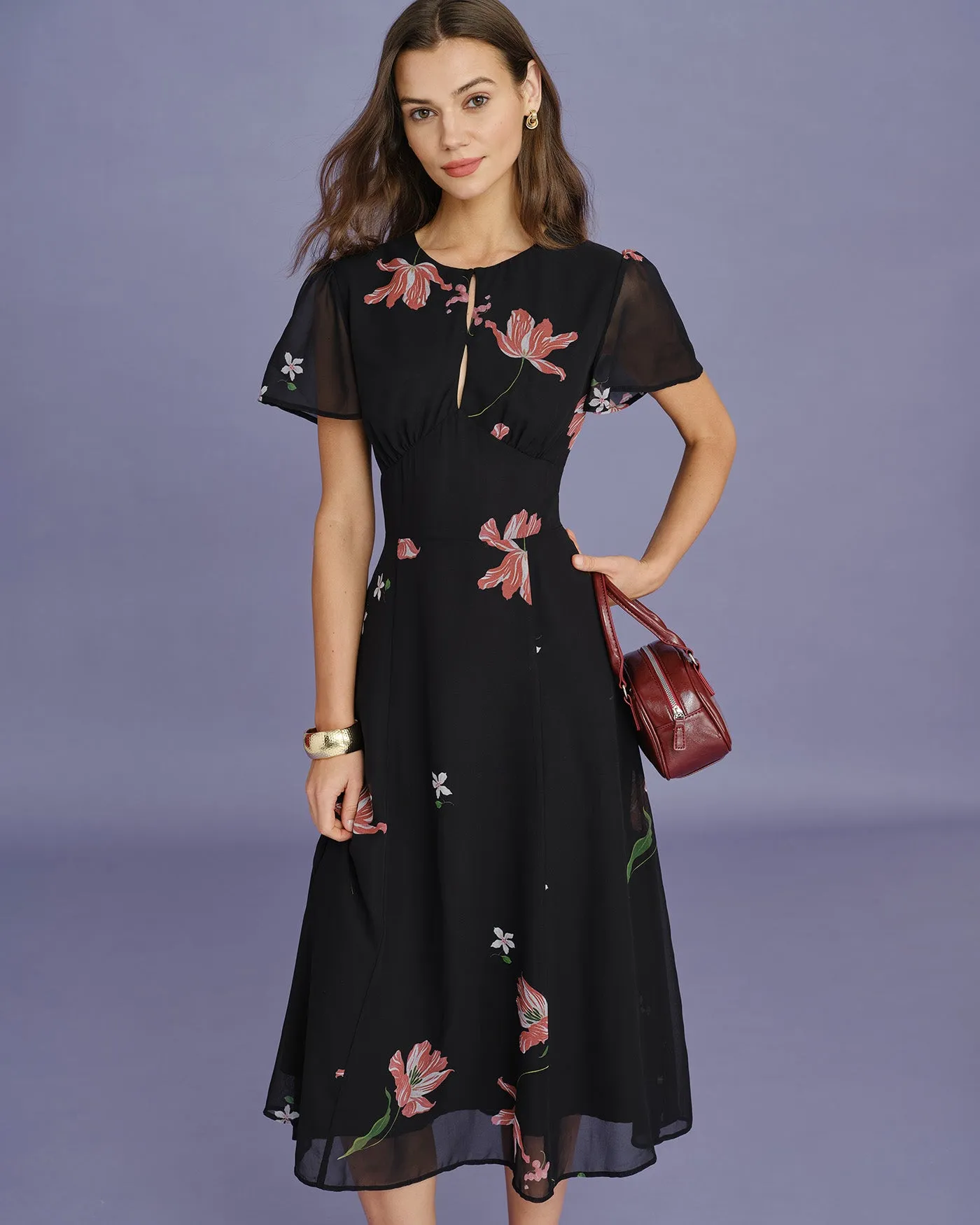 Black Cut Out Floral Midi Dress sold by rihoas