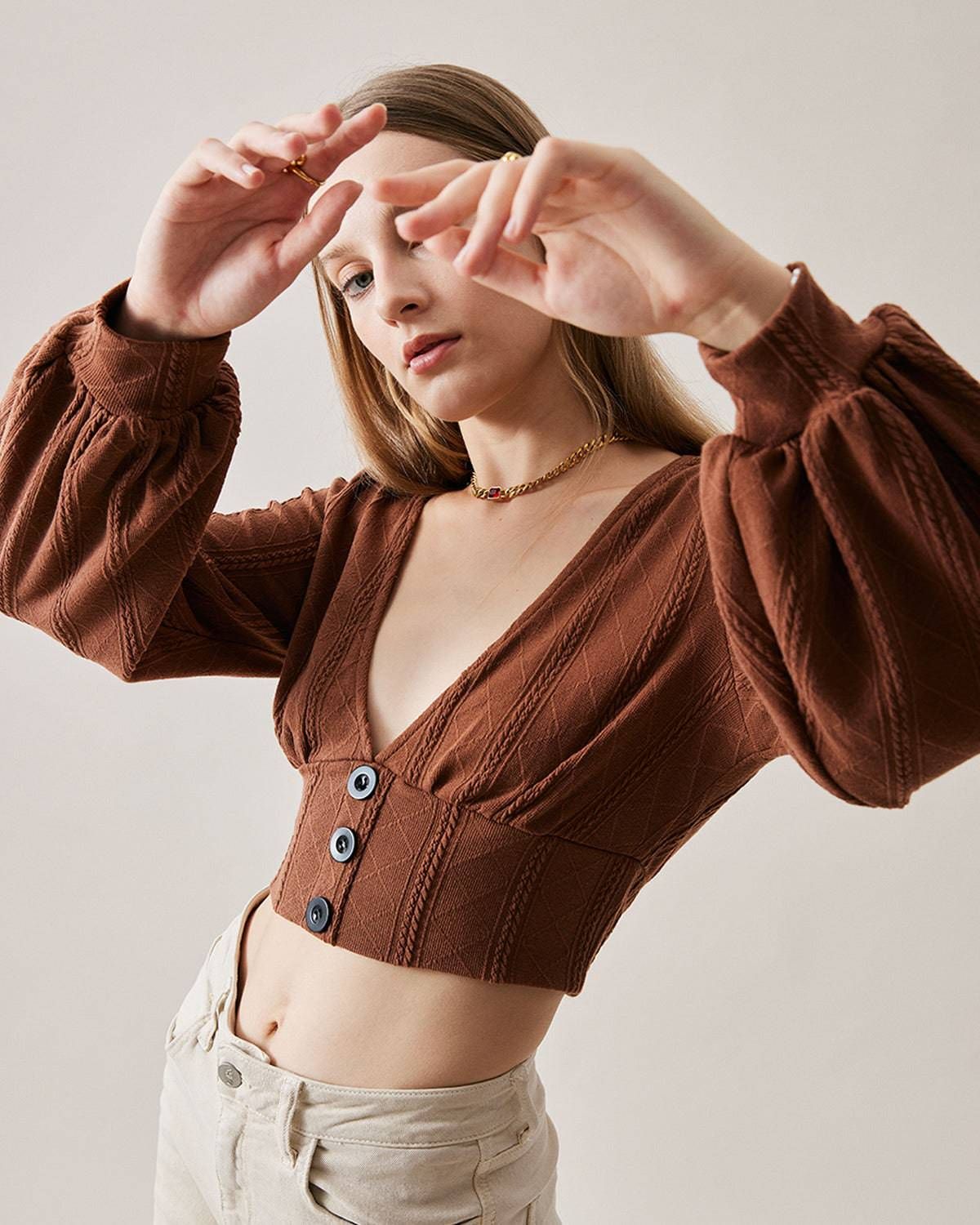 The Deep V-neck Knitted Crop Top sold by rihoas