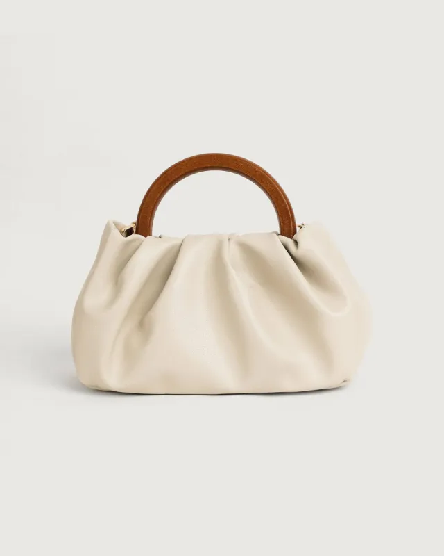 The Solid Ruched Handbag sold by rihoas