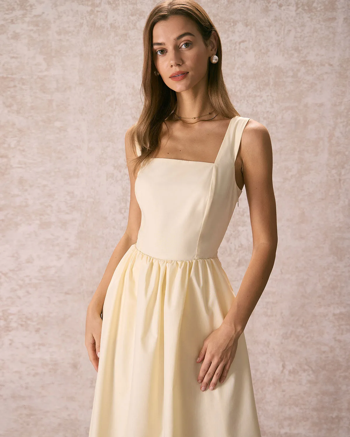 The Light Yellow Pleated Cross Back Midi Dress sold by rihoas product image thumbnail 2