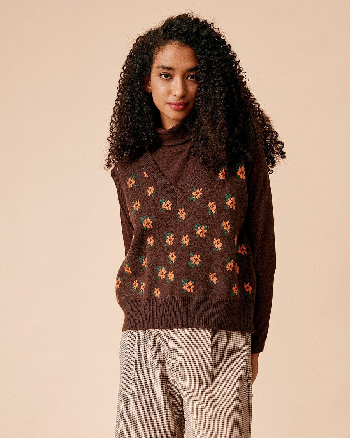 The V Neck Ribbed Floral Sweater Vest sold by rihoas