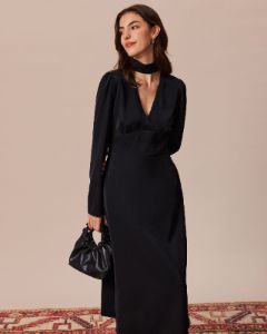 The Black Halter Cut Out Back Midi Dress sold by rihoas