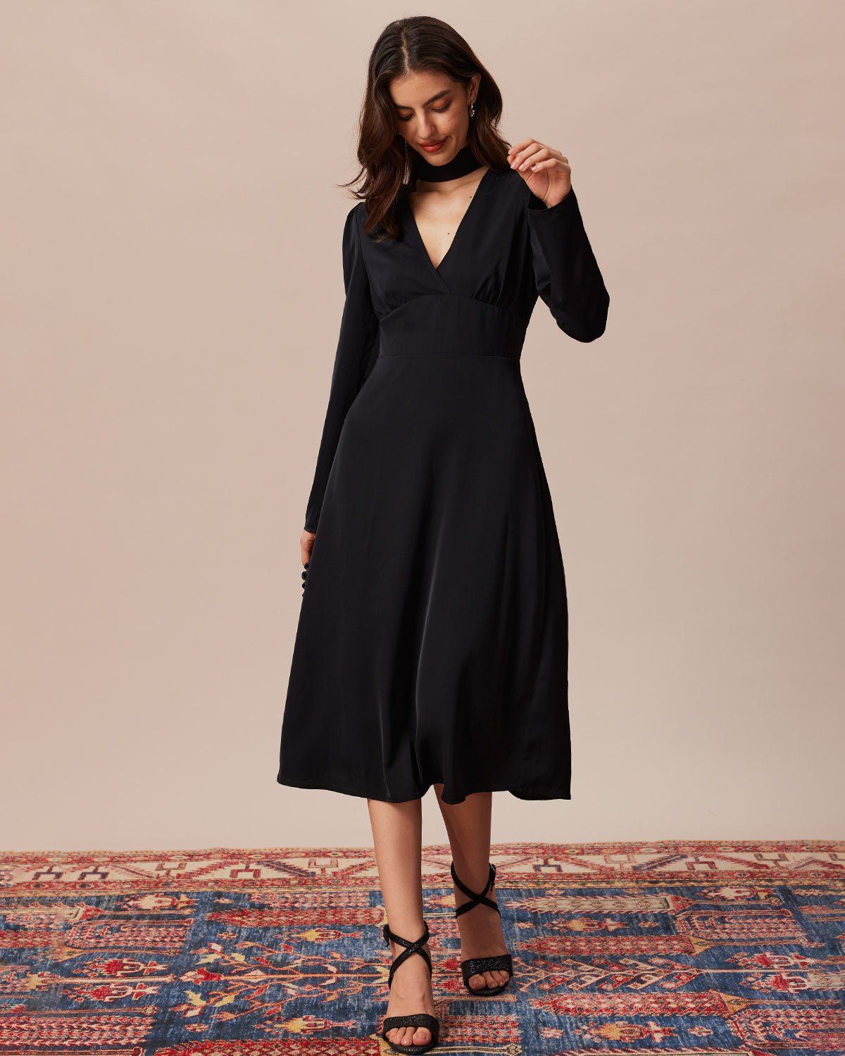 The Black Halter Cut Out Back Midi Dress sold by rihoas