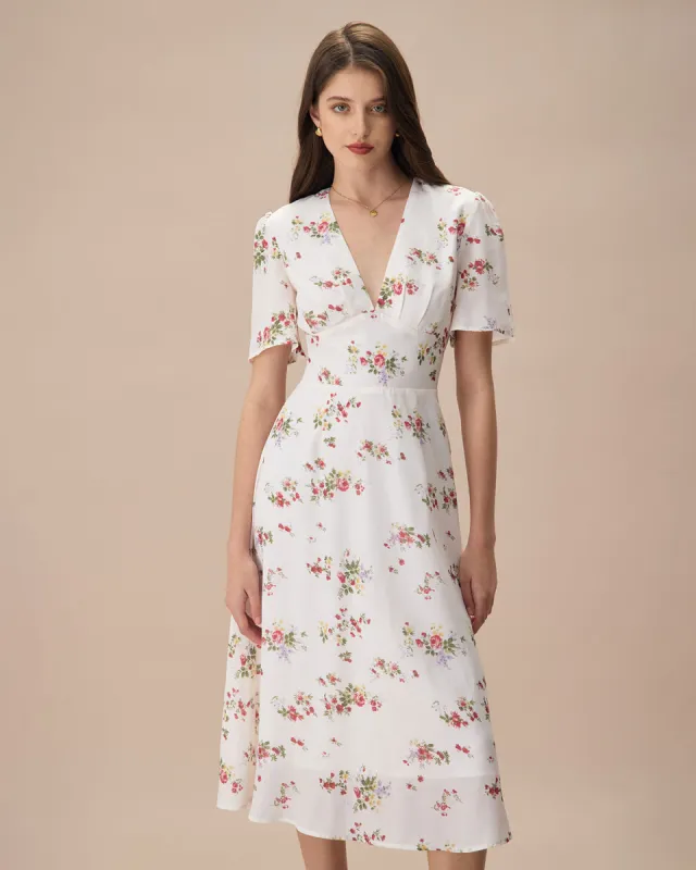 The Apricot V Neck Floral Ruched Midi Dress sold by rihoas
