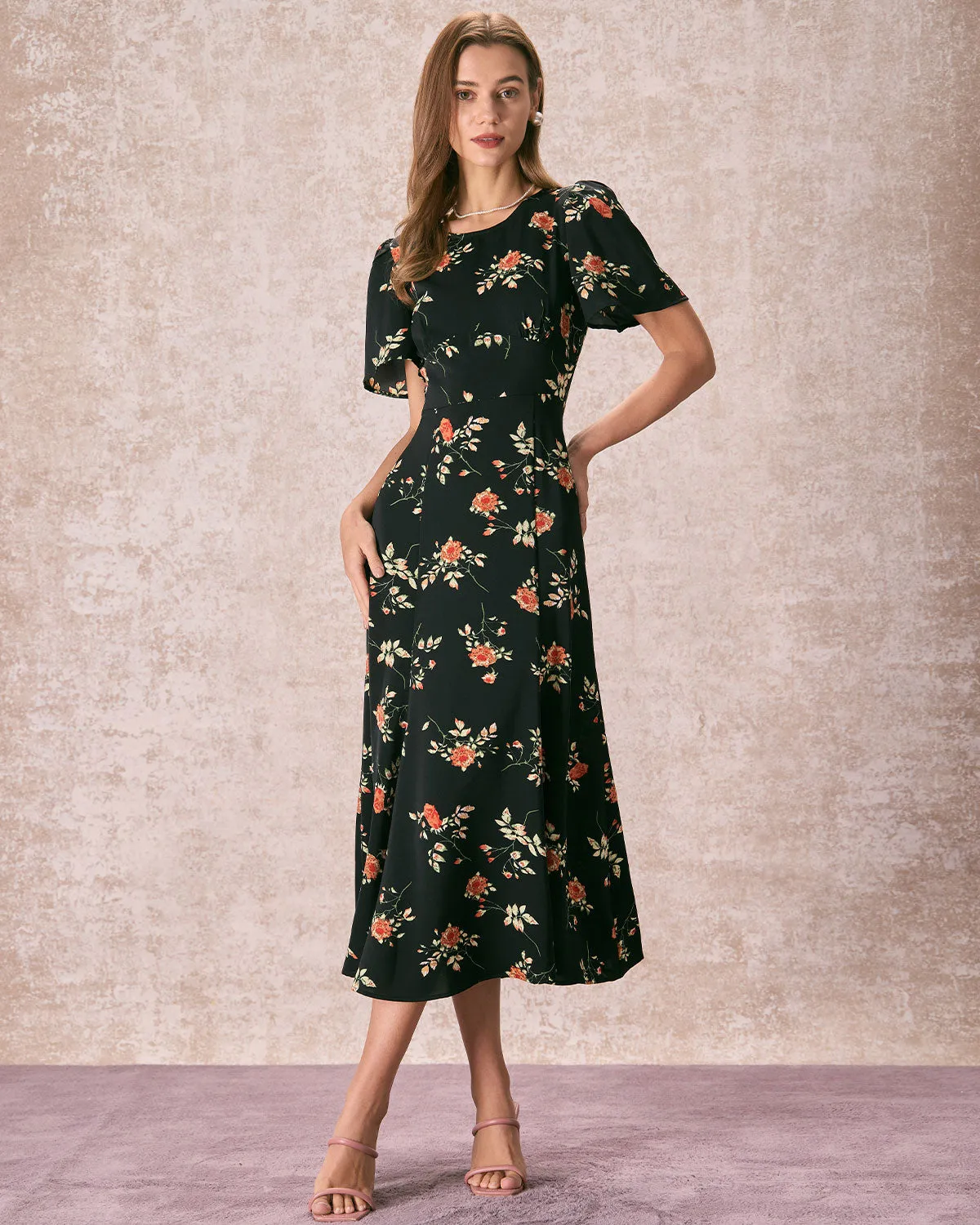 The Black Round Neck Floral Cutout Maxi Dress sold by rihoas product image thumbnail 3