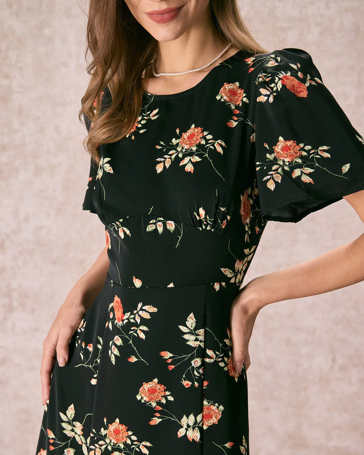 The Black Round Neck Floral Cutout Maxi Dress sold by rihoas product image thumbnail 2