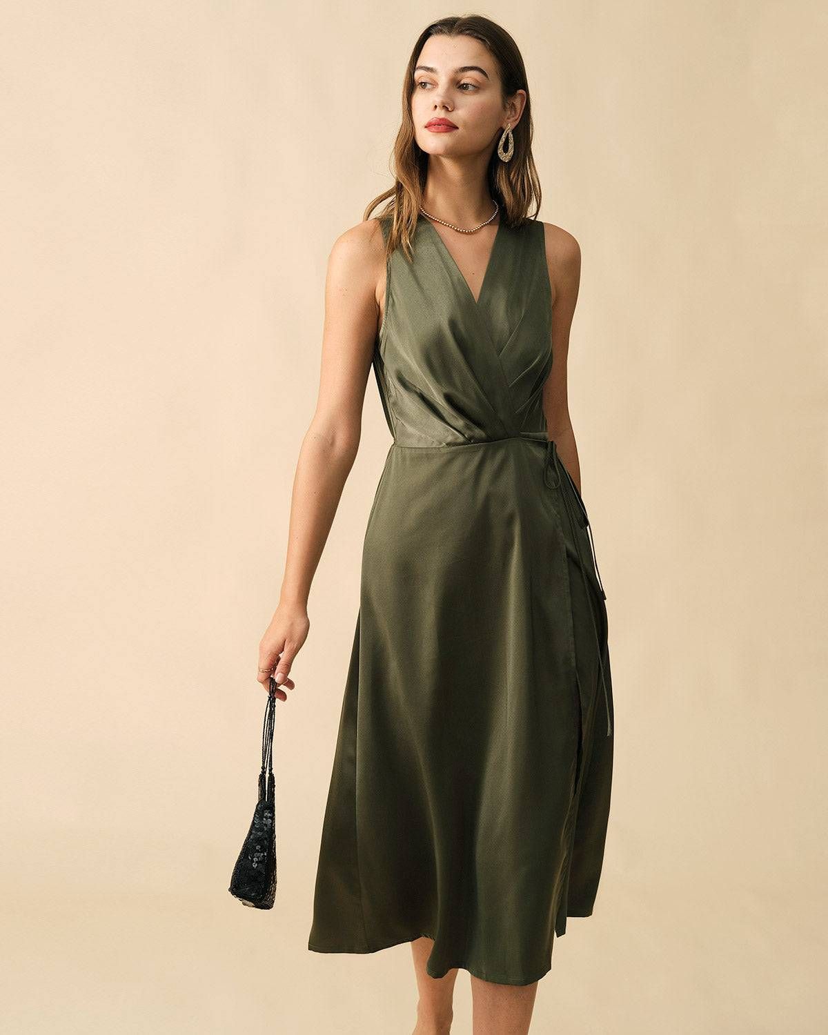 The Solid Sleeveless Wrap Midi Dress sold by rihoas