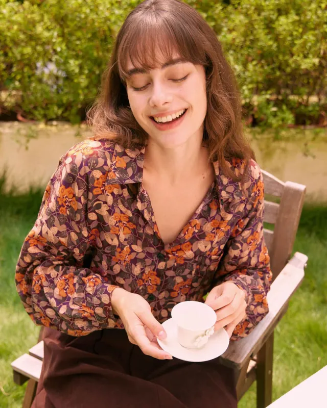 The Orange Collared Floral Button Up Shirt sold by rihoas
