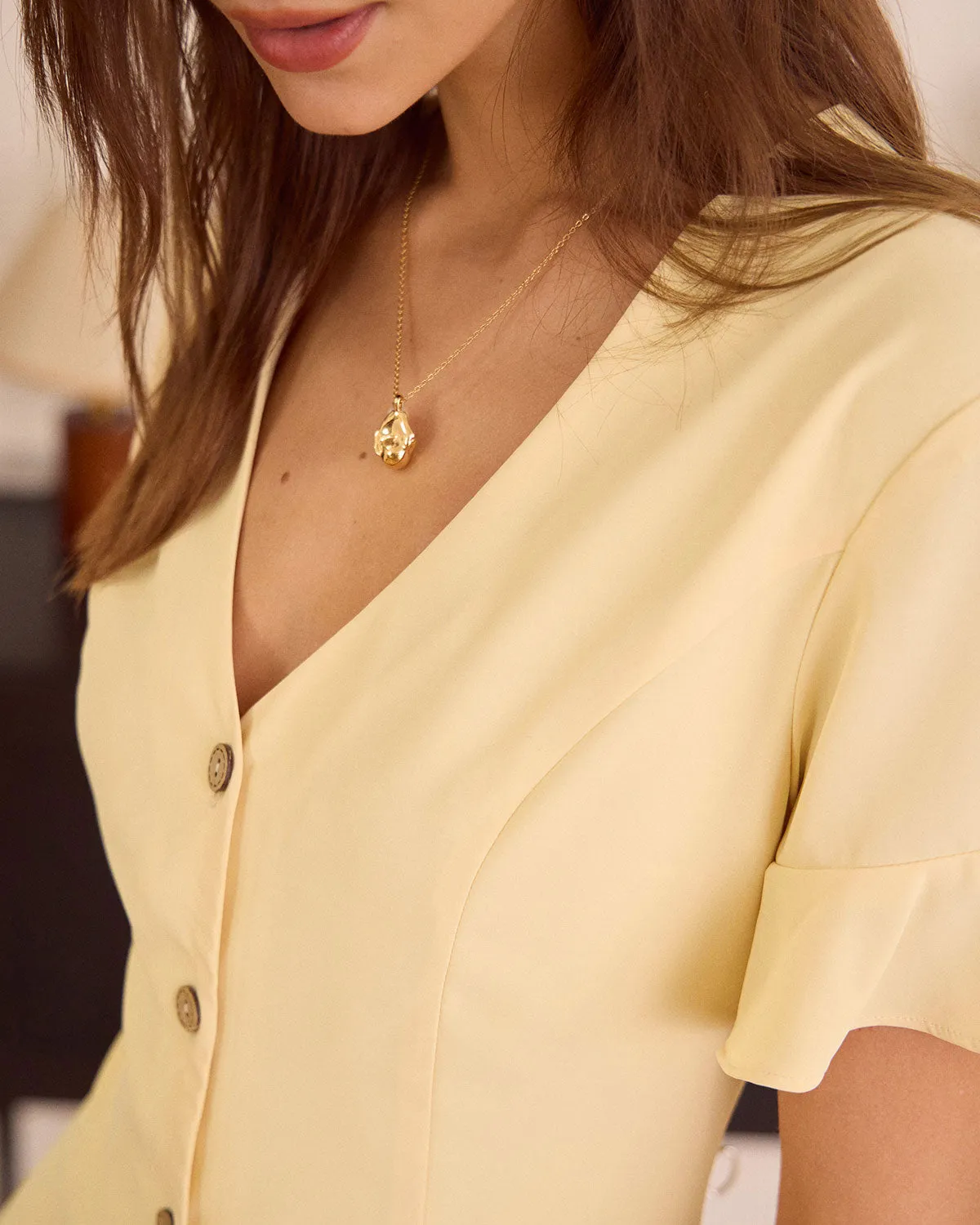 The Yellow V Neck Ruffle Button-up Mini Dress sold by rihoas product image thumbnail 2