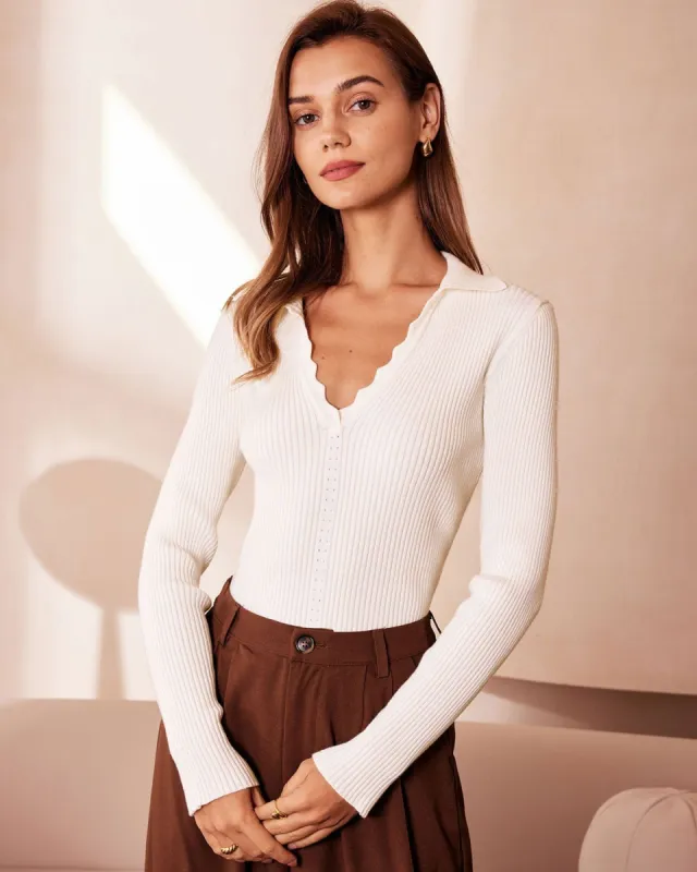 The White V Neck Scalloped Ribbed Knit Top sold by rihoas
