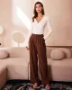 The White V Neck Scalloped Ribbed Knit Top sold by rihoas