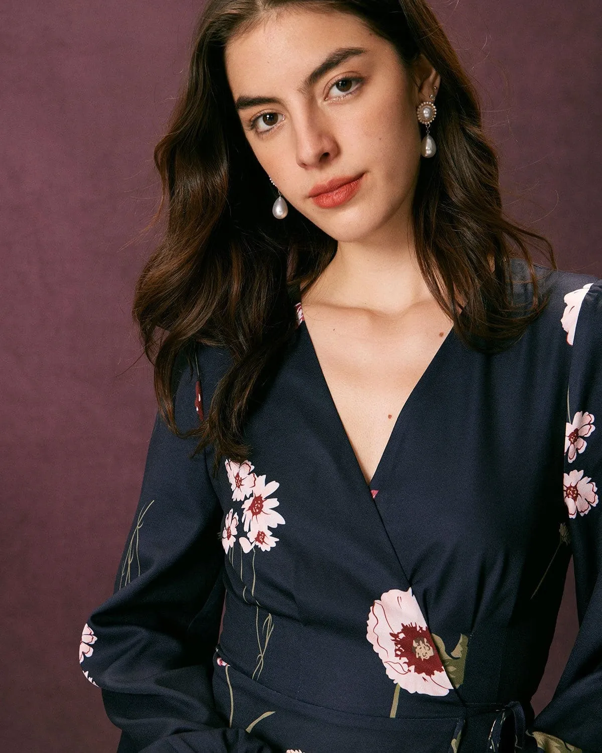 The Navy V Neck Floral Tie Wrap Mini Dress sold by rihoas product image thumbnail 2