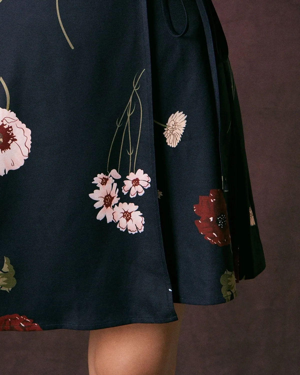 The Navy V Neck Floral Tie Wrap Mini Dress sold by rihoas product image thumbnail 3