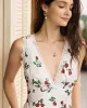 The White V Neck Lace Trim Floral Midi Dress sold by rihoas