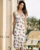 The White V Neck Lace Trim Floral Midi Dress sold by rihoas