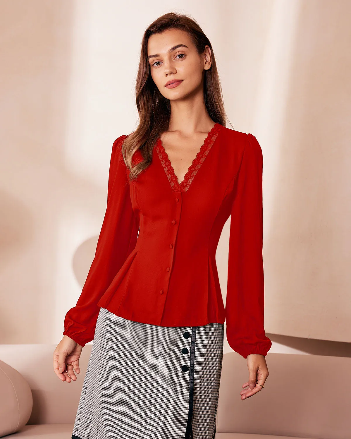 The Red V Neck Lace Trim Button Blouse sold by rihoas