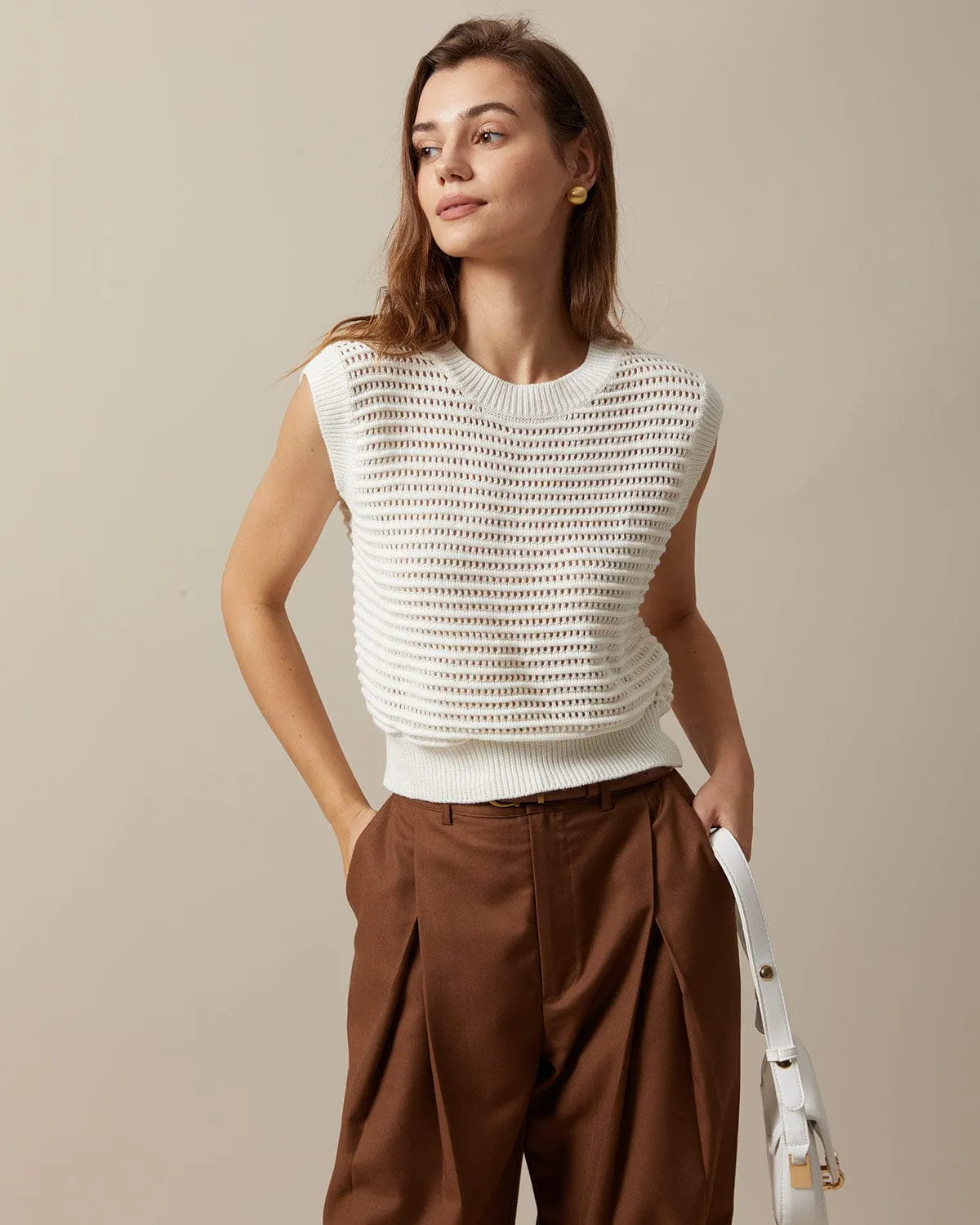 The Beige Sleeveless Pointelle Ribbed Knit Vest sold by rihoas